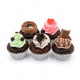 chocolate cup cakes with different icing toppings