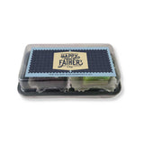 Twin pack pastries inclusive of brownie and kueh salat with a customised label on a white background