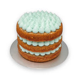First birthday naked cake featuring rustic layered sponge design with elegant decorative toppings