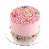Halal-certified customised cakes by Sweetest Moments Singapore, freshly made and perfect for all occasions – from pre-school celebrations to full month, 100 days, 1st and kids’ birthdays, weddings, guo da li, corporate events, and anniversaries. Available in chocolate, vanilla, red velvet, and eggless cakes with buttercream or fondant frosting. Free delivery available. pink, m&ms, chocolate, rainbow sprinkles