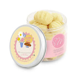 Jar of cookies with a decorative lid on a white background