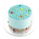 Halal-certified customised cakes by Sweetest Moments Singapore, freshly made and perfect for all occasions – from pre-school celebrations to full month, 100 days, 1st and kids’ birthdays, weddings, guo da li, corporate events, and anniversaries. Available in chocolate, vanilla, red velvet, and eggless cakes with buttercream or fondant frosting. Free delivery available. blue, m&ms, chocolate, rainbow sprinkles